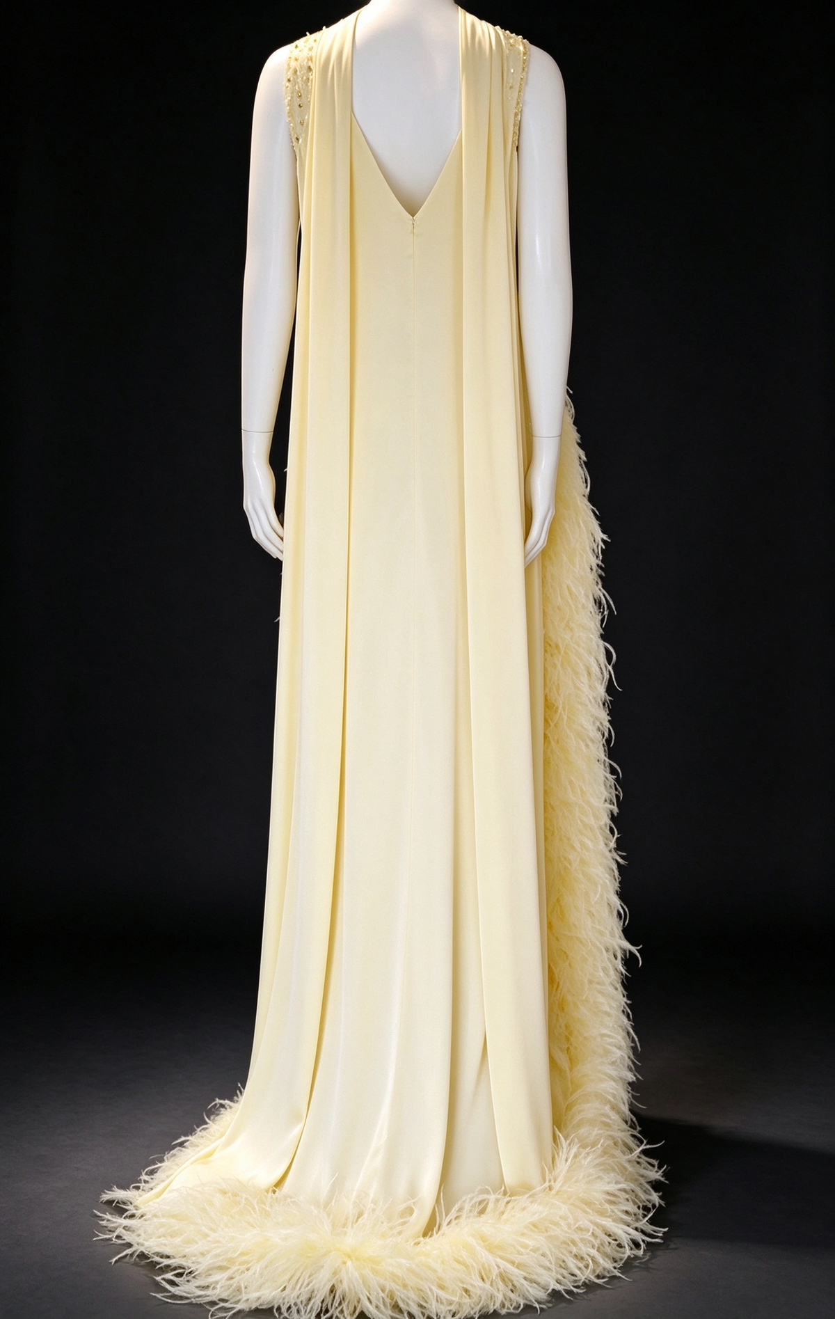 Pale Yellow High Neck Sleeveless Evening Gown with Hand-Beaded Floral Details & Ostrich Feather Trim fg9038